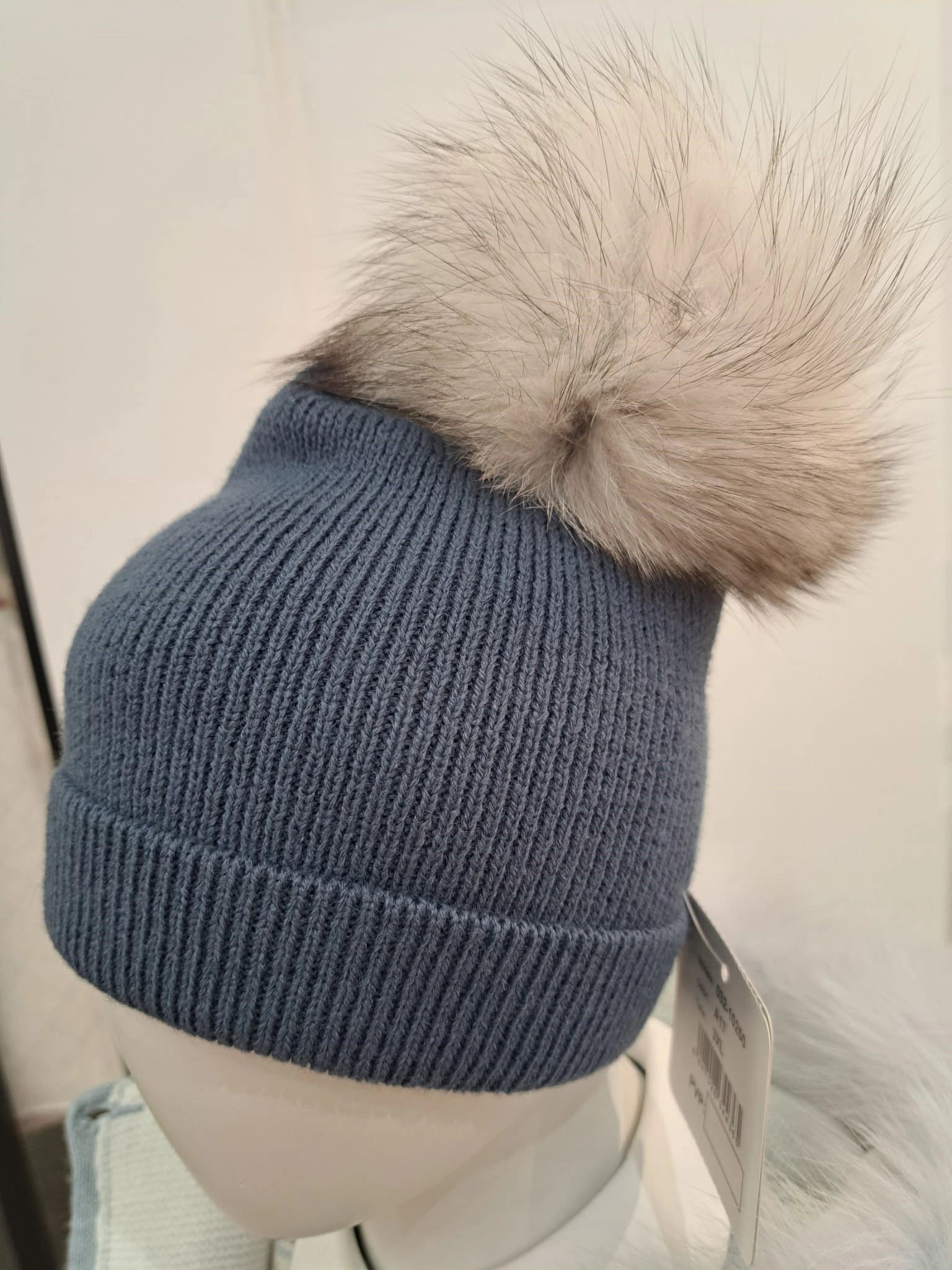 single pom fur hat by martin aranda